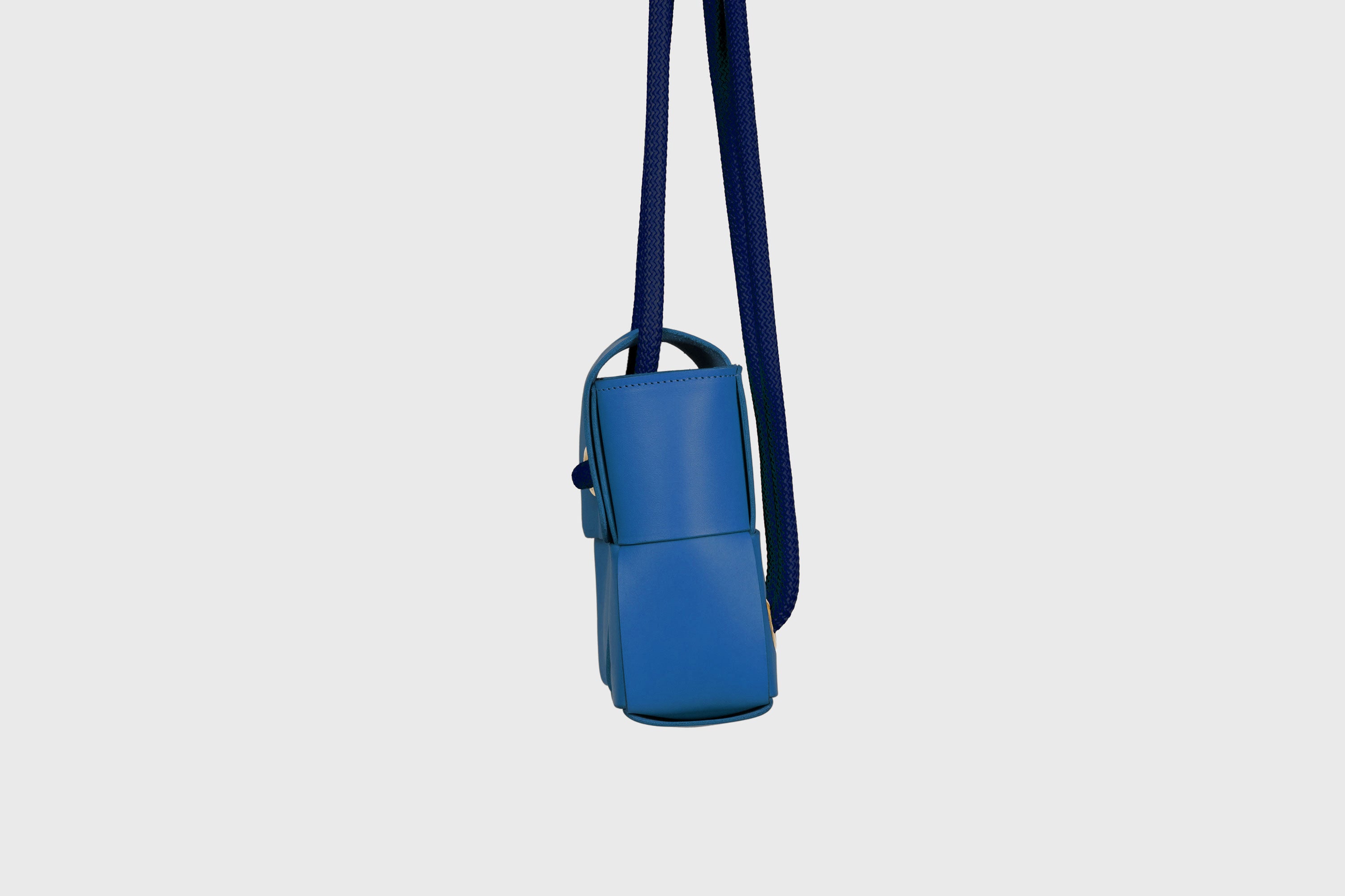 Elegant Atelier Madre Royal Blue Color woven leather backpack, designed by Manuel Dreesmann, showcasing exquisite craftsmanship and luxury style, crafted in the heart of Barcelona.