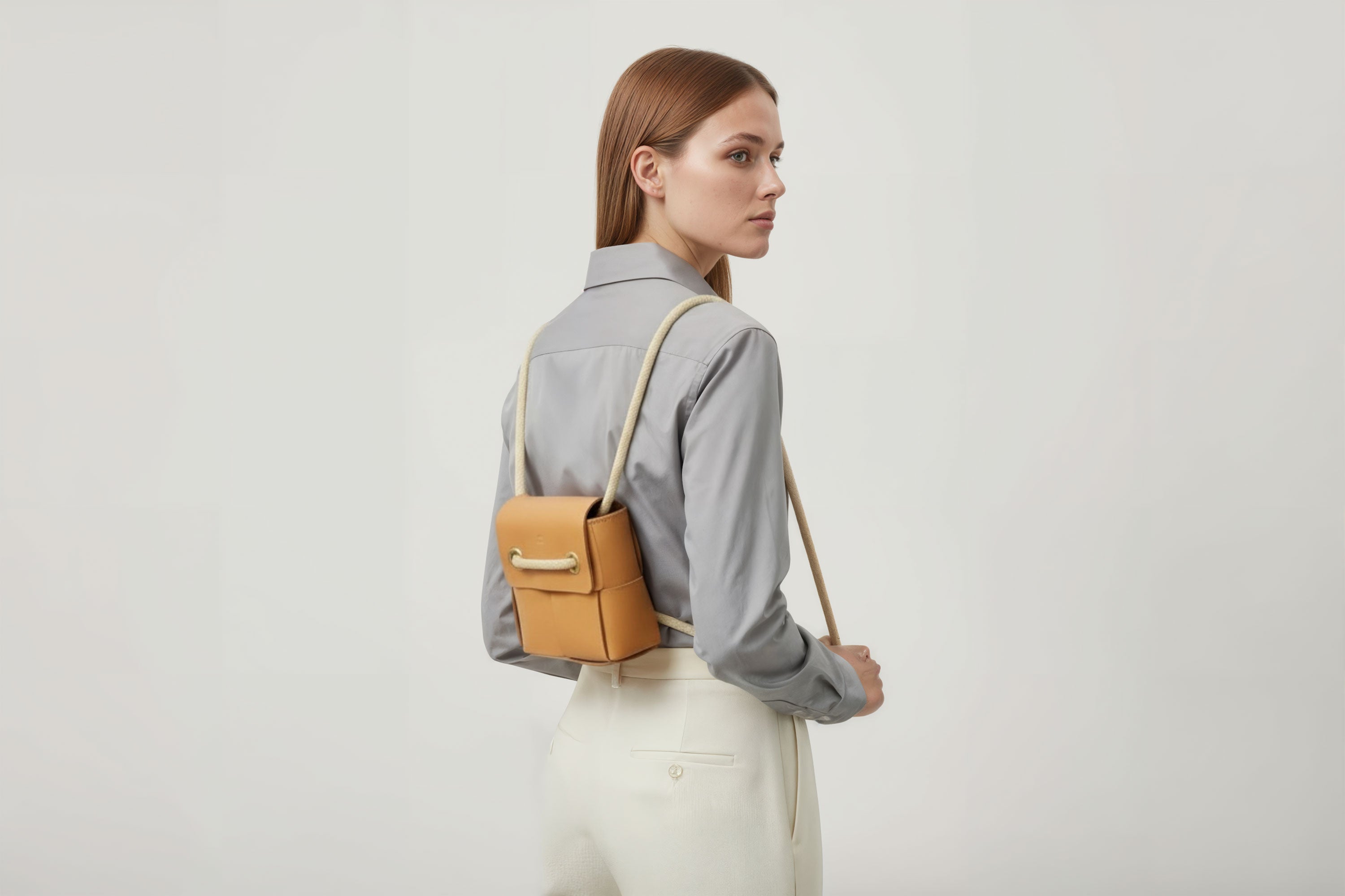 Woven Backpack Small Brown Leather On Model Minimalistic Design Atelier Madre Manuel Dreesmann Barcelona 