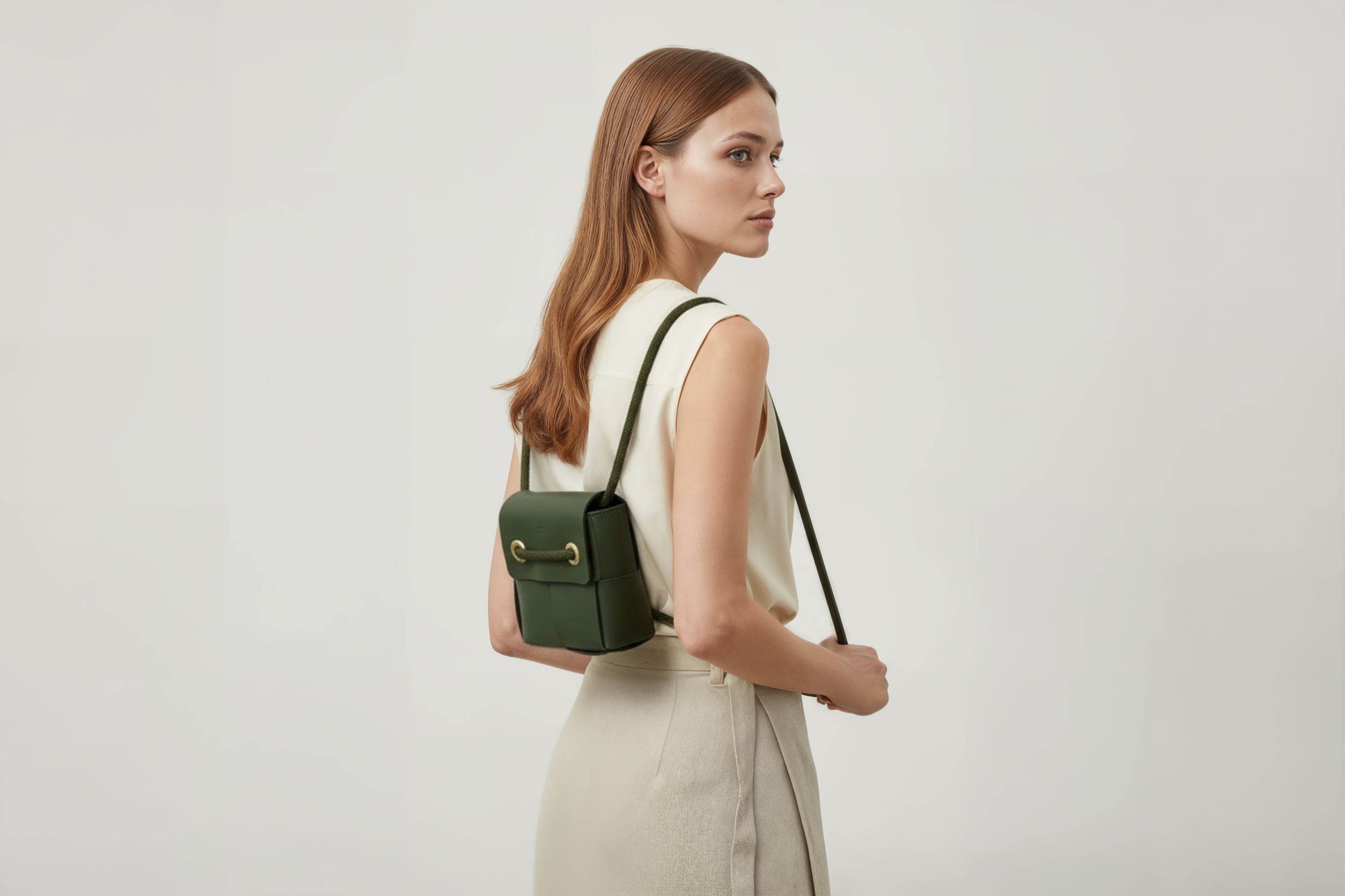 Woven Backpack Small Olive Green Leather On Model Minimalistic Design Atelier Madre Manuel Dreesmann Barcelona 