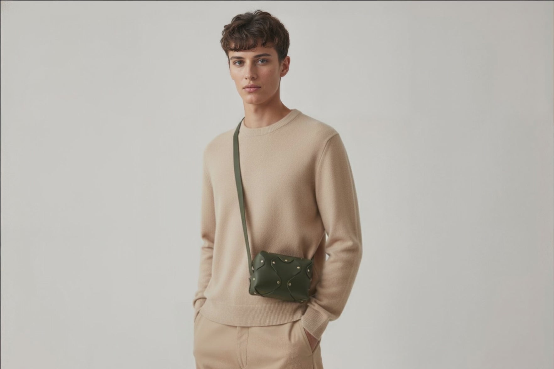 Marlin Leather Bag Small Olive Green Color On A Man Model Premium Quality Minimalist Design Atelier Madre Manuel Dreesmann Barcelona Spain