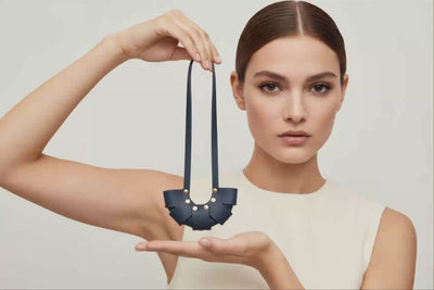 Marine Blue Color Leather Croissant Bag Charm Minimal Premium Design On Model Video Loop Atelier Madre Manuel Dreesmann Barcelona Spain