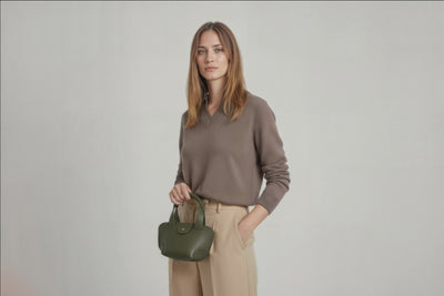 Mini Tote Bag Olive Green Color Leather Handbag On A Woman Model Small Modern Minimalist Design Premium Quality Atelier Madre Manuel Dreesmann Barcelona Spain