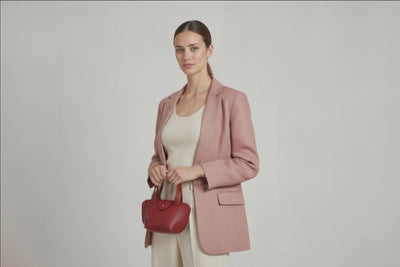 Mini Tote Bag Red Color Leather Handbag On A Woman Model Small Modern Minimalist Design Premium Quality Atelier Madre Manuel Dreesmann Barcelona Spain