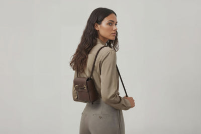 Woven Backpack Small Dark Brown Leather On Model Minimalistic Design Atelier Madre Manuel Dreesmann Barcelona 