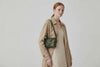 Woven Leather Bag Saka Bag Olive Green Color Leather On Woman Model Bright Background Vegetable Tanned Leather Modern Minimalist Design Premium Quality Atelier Madre Manuel Dreesmann Barcelona Spain Video Loop