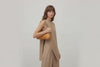 Fiona Bag Brown Color Leather On Model Bright Background Vegetable Tanned Leather Video Loop Walking Modern Minimalist Design Premium Quality Atelier Madre Manuel Dreesmann Barcelona Spain
