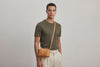 Rivet Bag Small Leather Brown Color Clutch On Model Video Loop Walk Crossbody Shoulder Detachable Full Brass Vegetable Tanned Full Grain Leather High Quality Modern Minimalistic Design Atelier Madre Manuel Dreesmann Barcelona Spain