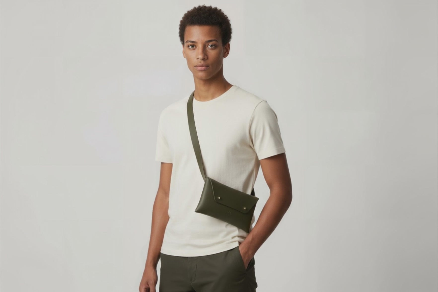 Belt Bag Leather Olive Green Color On A Man Model Fanny Pack Waist Bag Vegetable Tanned Leather Full Grain Premium Quality Modern Minimalist Design Atelier Madre Manuel Dreesmann Barcelona Spain