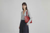 Tote Bag Leather Zipper Red Color On A Woman Model Premium Quality Minimalist Design Atelier Madre Manuel Dreesmann Barcelona Spain