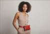 Belt Bag Leather Red Color On A Woman Model Fanny Pack Waist Bag Vegetable Tanned Leather Full Grain Premium Quality Modern Minimalist Design Atelier Madre Manuel Dreesmann Barcelona Spain