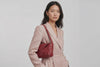 Leather Bag Red Color Big Saka On A Woman Model Loop Video Braided  Vegetable Tanned Leather Modern Minimalist Design Premium Quality Atelier Madre Manuel Dreesmann Barcelona Spain