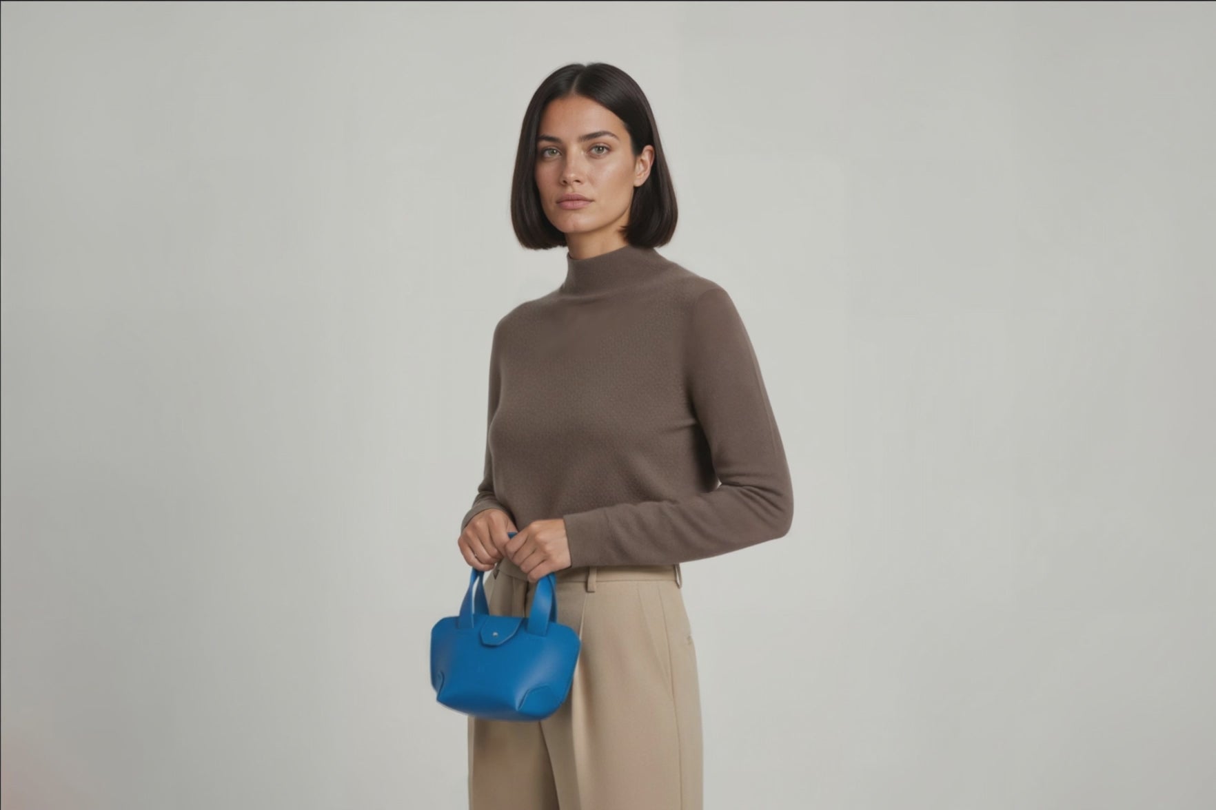 Mini Tote Bag Royal Blue Color Leather Handbag On A Woman Model Small Modern Minimalist Design Premium Quality Atelier Madre Manuel Dreesmann Barcelona Spain