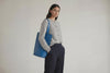 Tote Bag Long Royal Blue Leather Bag On A Woman Model Vegetable Tanned Leather Exclusive Quality Craftsmanship Handmade Design By Manuel Dreesmann Atelier Madre Barcelona Spain