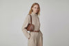 Medium Tote Bag Dark Brown Color On Model Video Loop Leather Premium Quality Minimalist Modern Design Atelier Madre Manuel Dreesmann Barcelona Spain
