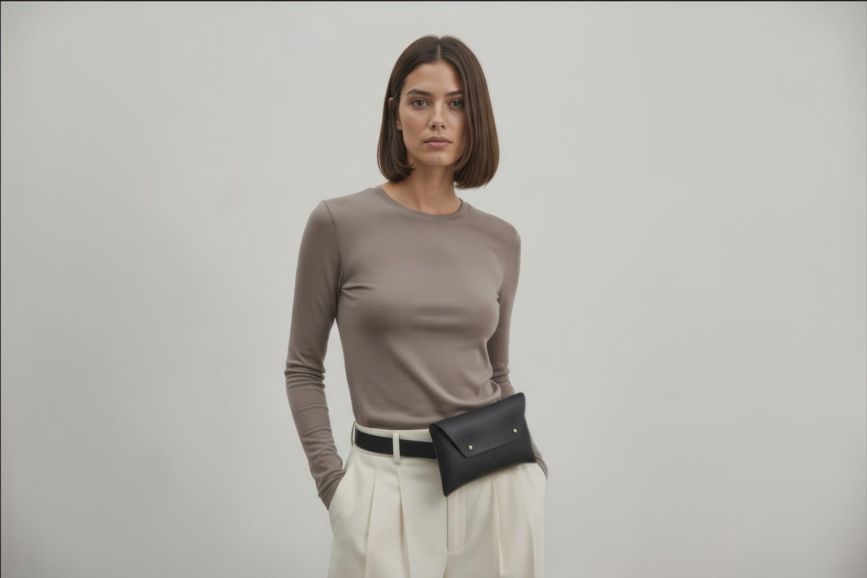 Belt Bag Leather Black Color On A Woman Model Fanny Pack Waist Bag Vegetable Tanned Leather Full Grain Premium Quality Modern Minimalist Design Atelier Madre Manuel Dreesmann Barcelona Spain