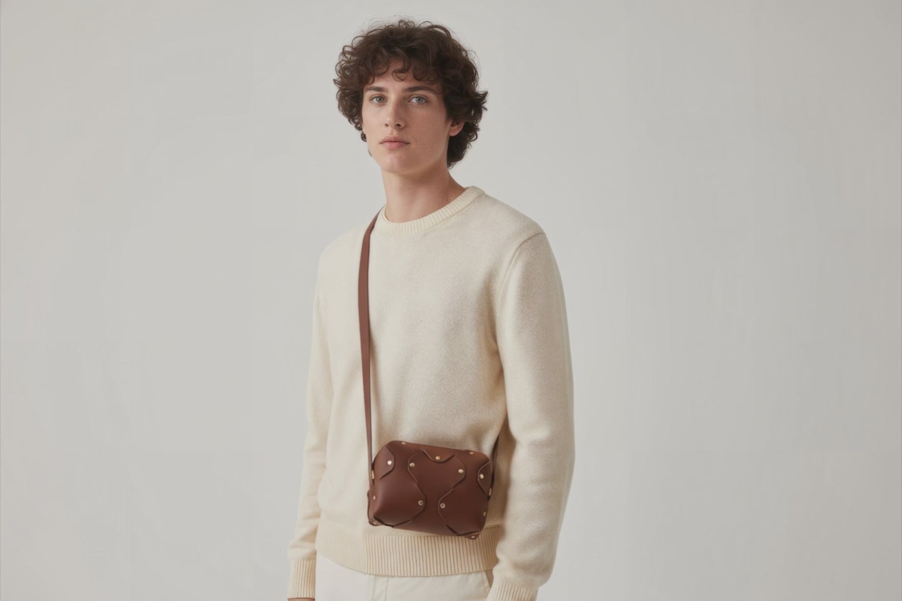 Marlin Leather Bag Small Dark Brown Color On A Man Model Premium Quality Minimalist Design Atelier Madre Manuel Dreesmann Barcelona Spain