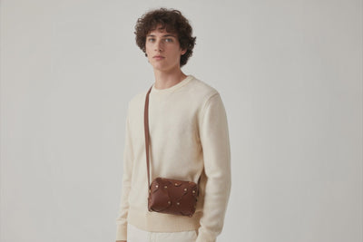 Marlin Leather Bag Small Dark Brown Color On A Man Model Premium Quality Minimalist Design Atelier Madre Manuel Dreesmann Barcelona Spain