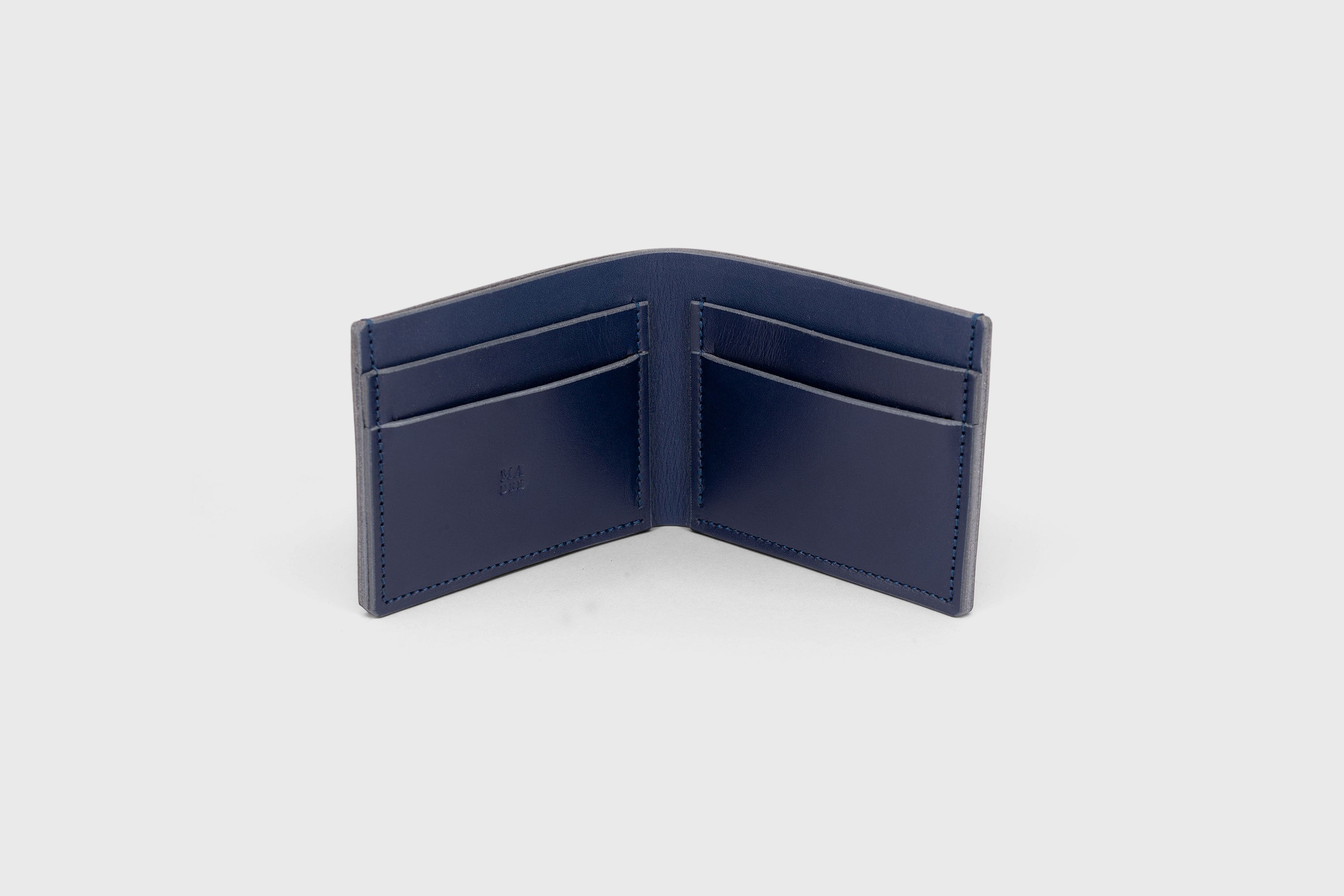 Bifold Wallet Dark Marine Blue Leather Vegetable Tanned Leather Premium Classic Design and Handcrafted By Atelier Madre Manuel Dreeesmann Barcelona Spain