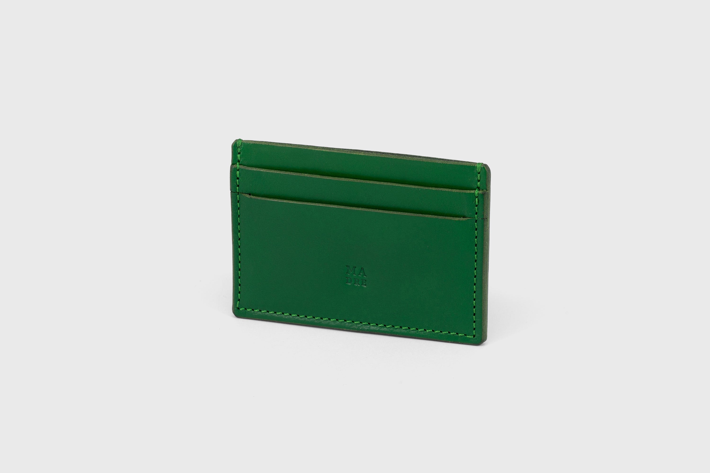 Credit Card Wallet in Grass Green Leather Vachetta Calf Vegetable Tanned Leather Handmade and Design by Atelier Madre Manuel Dreesmann Barcelona Spain
