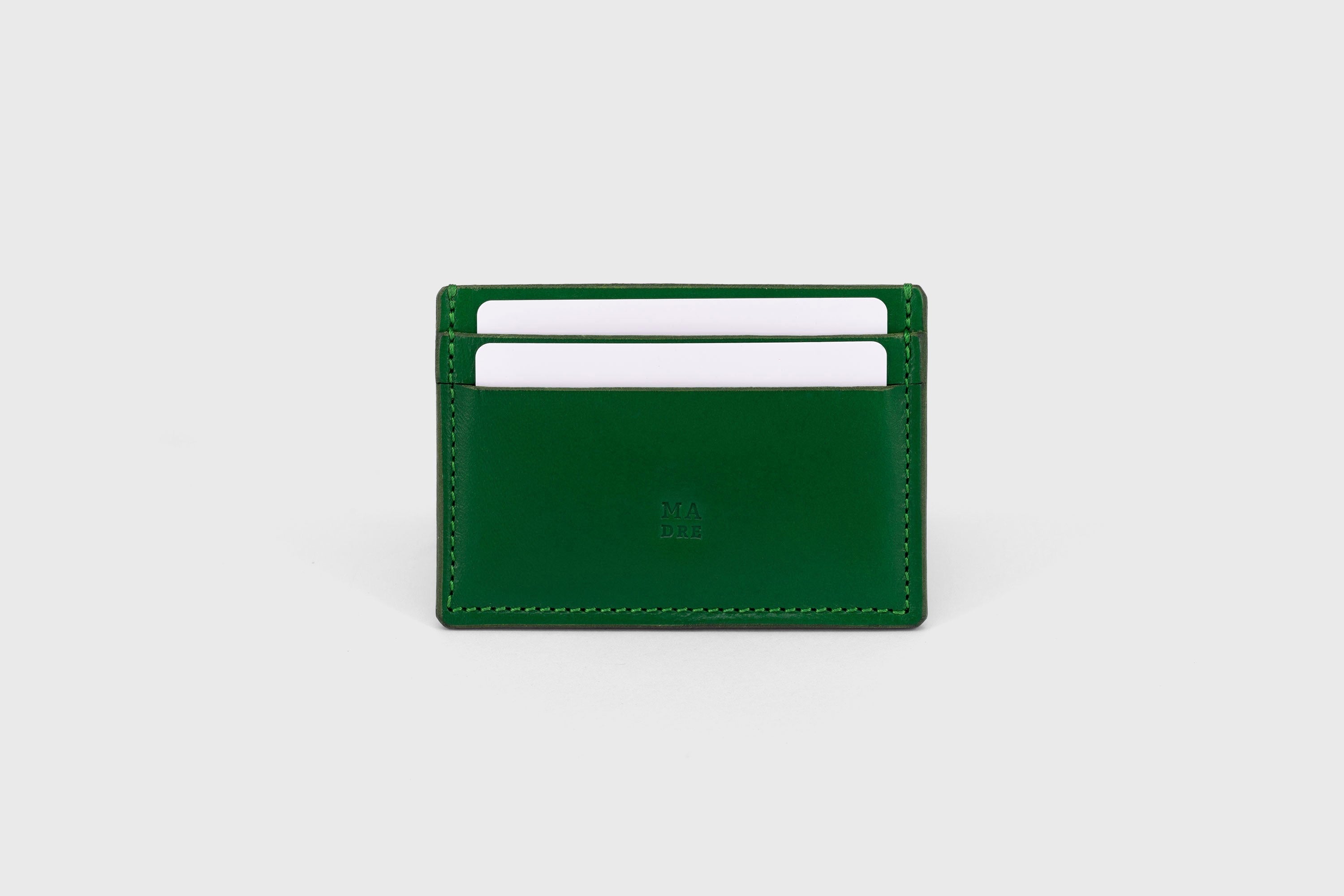 Credit Card Wallet in Grass Green Leather Vachetta Vegetable Tanned Leather Handmade and Design by Atelier Madre Manuel Dreesmann Barcelona Spain