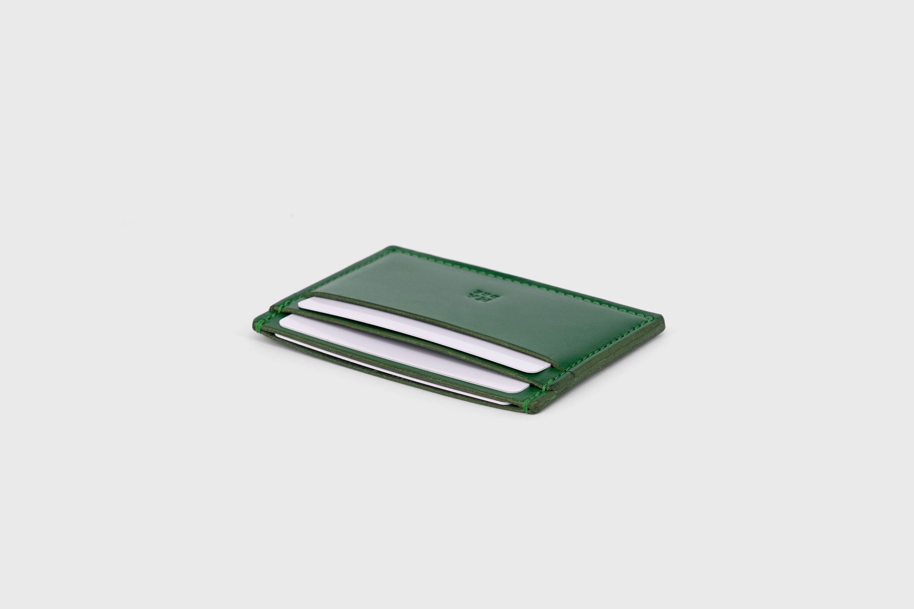 Credit Card Wallet in Grass Green Leather Vachetta Vegetable Tanned Leather Handmade and Designer Atelier Madre Manuel Dreesmann Barcelona Spain