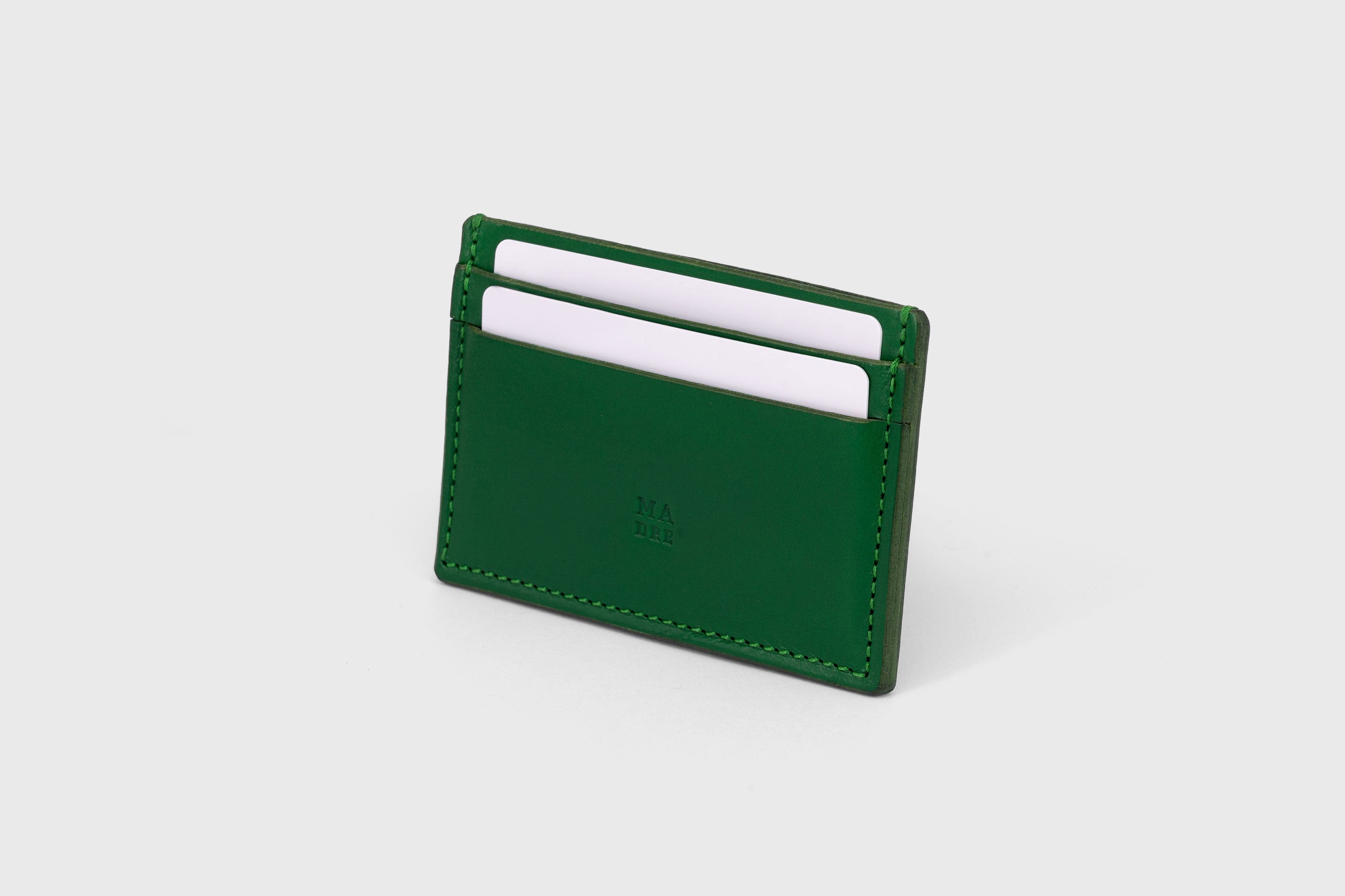 Credit Card Wallet in Grass Green Leather Vachetta Vegetable Tanned Leather Handmade Craftmanship and Design by Atelier Madre Manuel Dreesmann Barcelona Spain