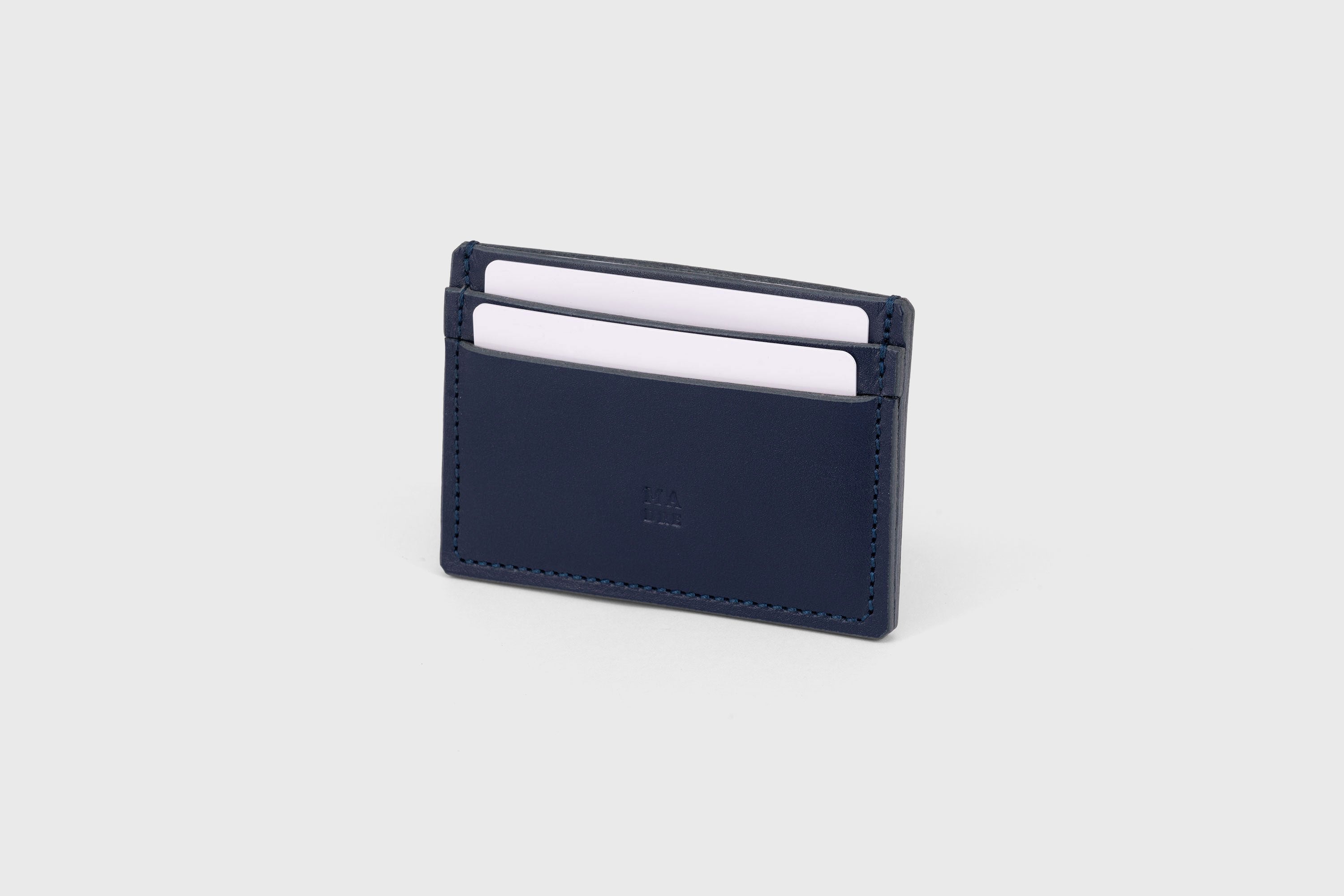 Credit Card Wallet in Marine Blue Leather Vachetta Vegetable Tanned Leather Handmade and Modern Design by Atelier Madre Manuel Dreesmann Barcelona Spain