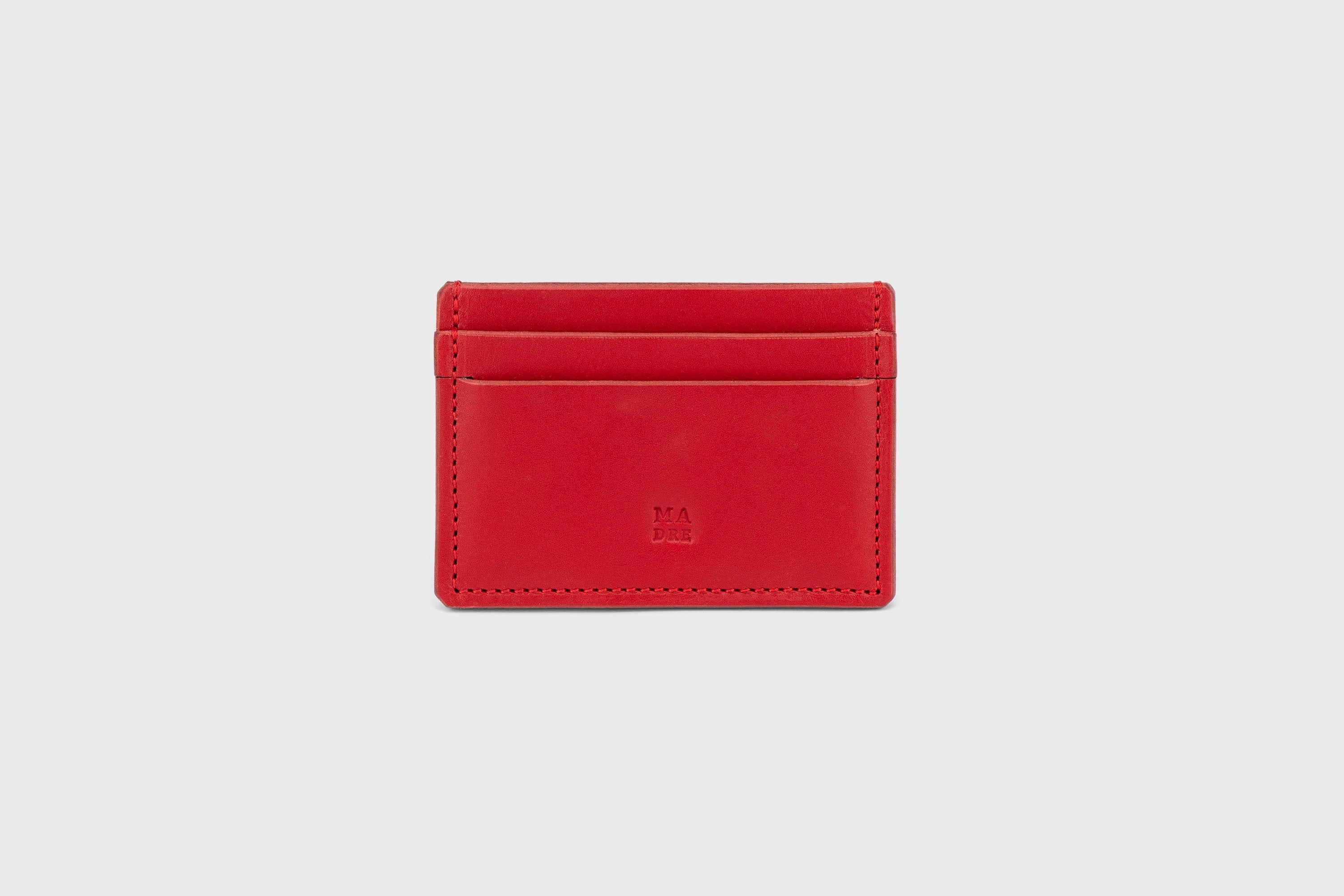 Credit Card Wallet in Red Leather Vachetta Vegetable Tanned Leather Handmade and Sleek Design by Atelier Madre Manuel Dreesmann Barcelona Spain