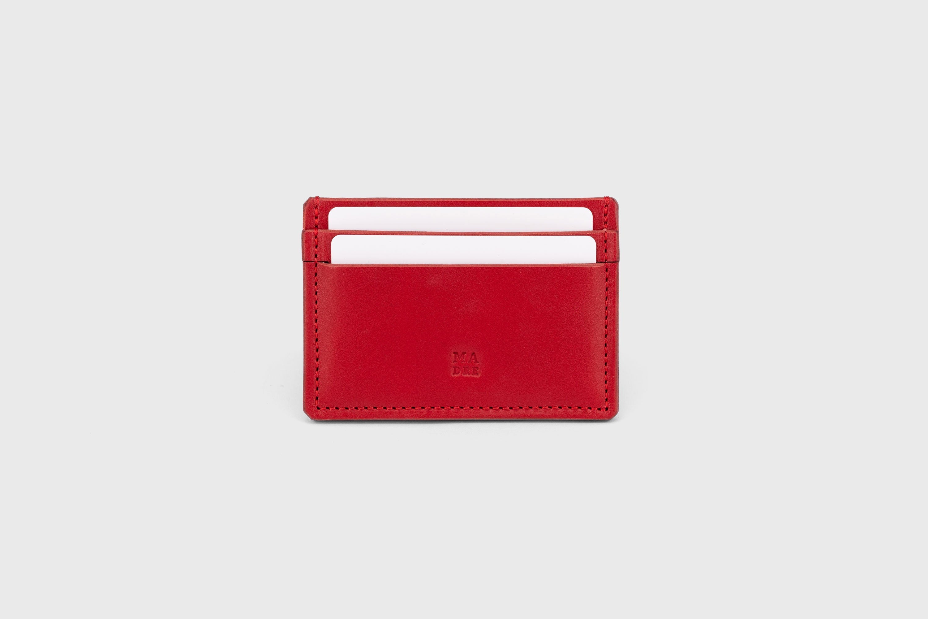 Credit Card Wallet in Red Leather Vachetta Vegetable Tanned Leather Handmade and Design by Atelier Madre Manuel Dreesmann Barcelona Spain