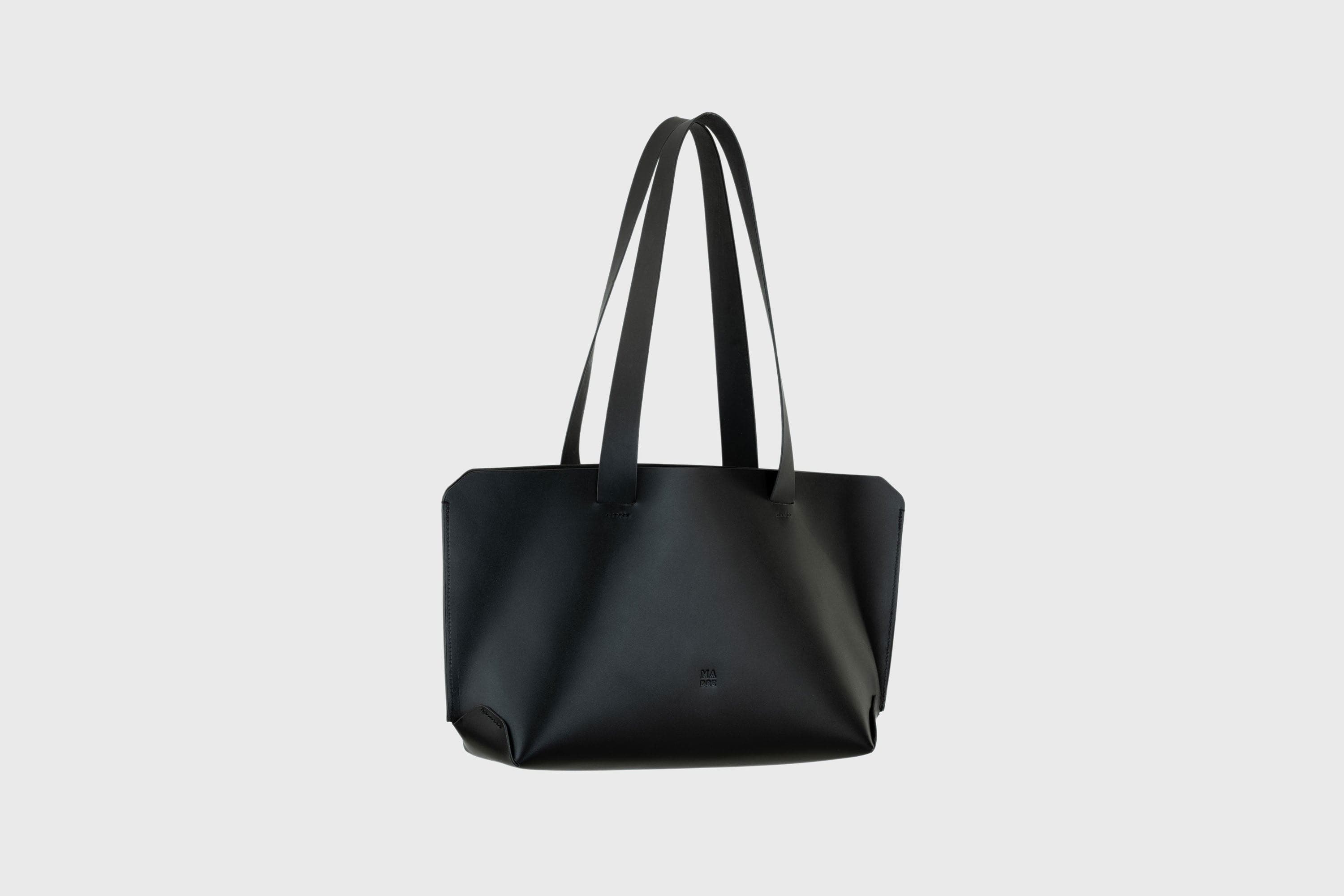 Tote Bag Black Color Vegetable Tanned Vachetta Leather Diagonal View Luxury Design By Manuel Dreesmann Atelier Madre Barcelona Spain