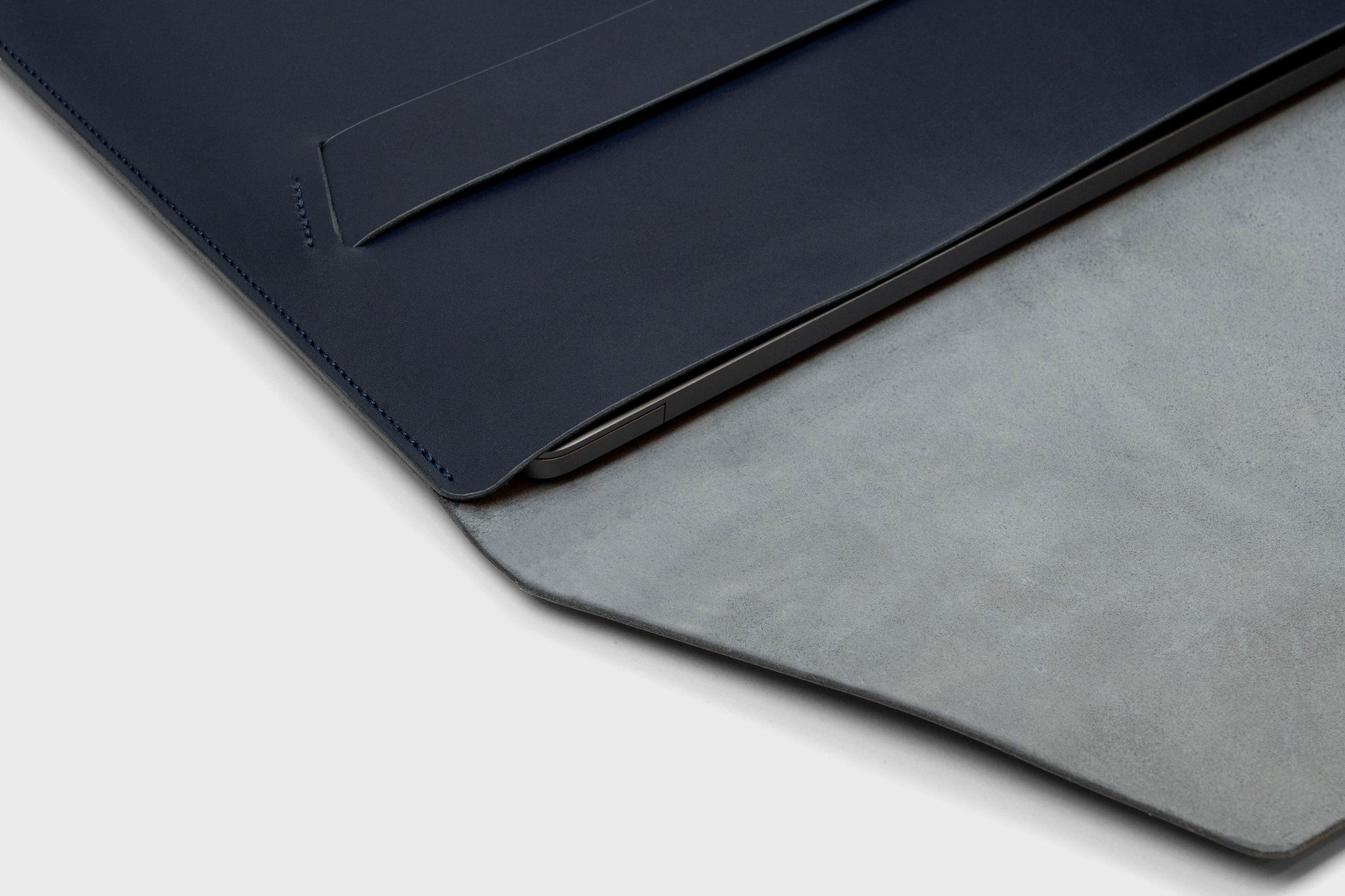 MacBook Pro 14 Inch Leather Vegetable Tanned Leather Sleeve Dark Marine Blue Color Handmade and Designed By Manuel Dreesmann Atelier Madre Barcelona Spain