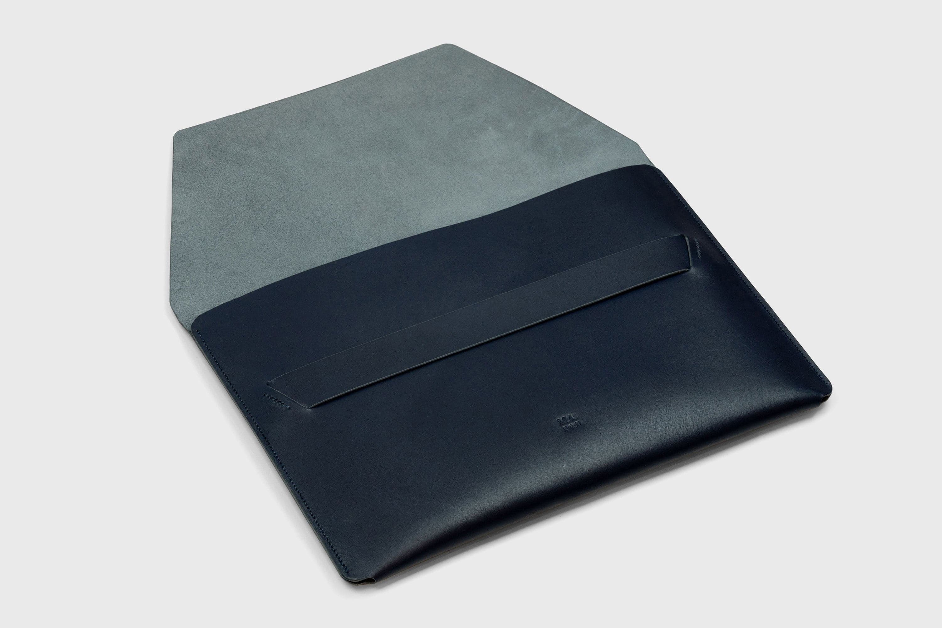 MacBook Pro 14 Inch Leather Vegetable Tanned Leather Sleeve Dark Marine Blue Color Luxury Quality Handmade and Designed By Manuel Dreesmann Atelier Madre Barcelona Spain