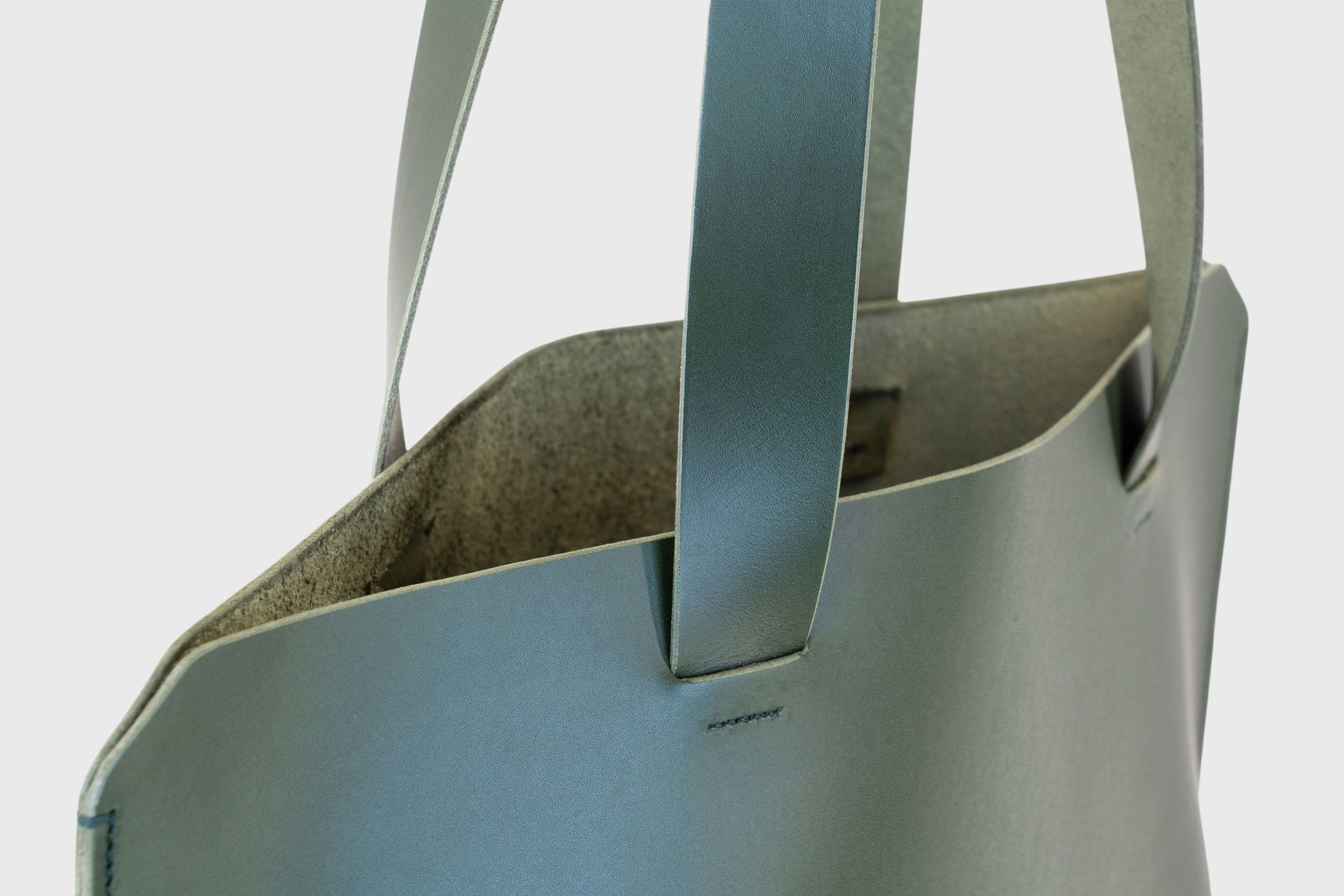 Detail Photo of Handstitching Tote Bag Olive Green Vegetable Tanned Leather Minimalistic Design By Manuel Dreesmann Atelier Madre Barcelona Spain